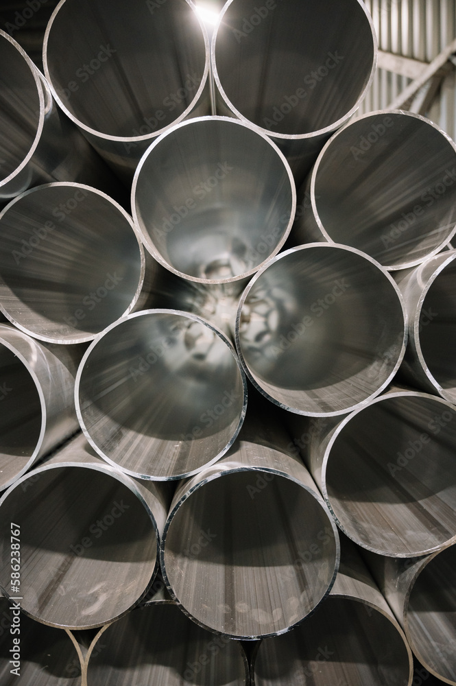 Huge metal pipes in a metal cutting plant Huge metal pipes in a metal cutting plant