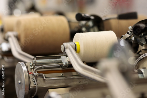 king spool sewing thread winding machine close up photo
