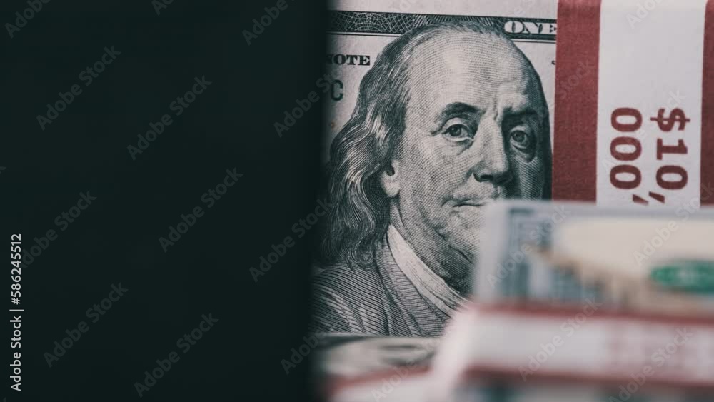 Bundles Of 10000 American Dollars Banknotes In Bank Packs Rotate On The 