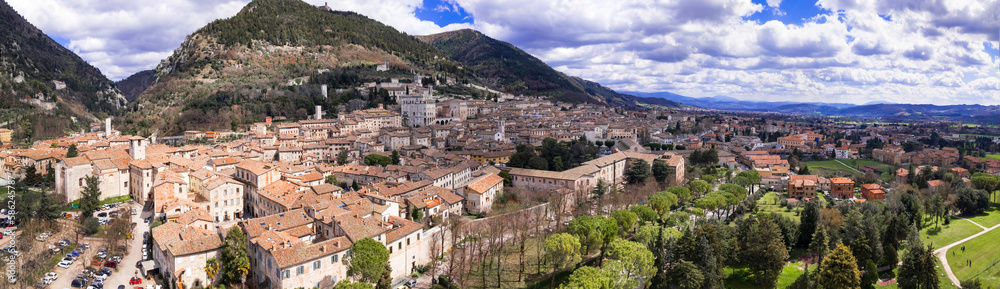 Aerial drone panoramic view of medieval town Gubbio in Umbria.  Italy travel .great historical italian landmarks and best tourist destinations