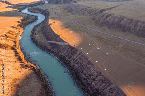 Aerial top view autumn Landscape beautiful forest and river mountains Altai photo