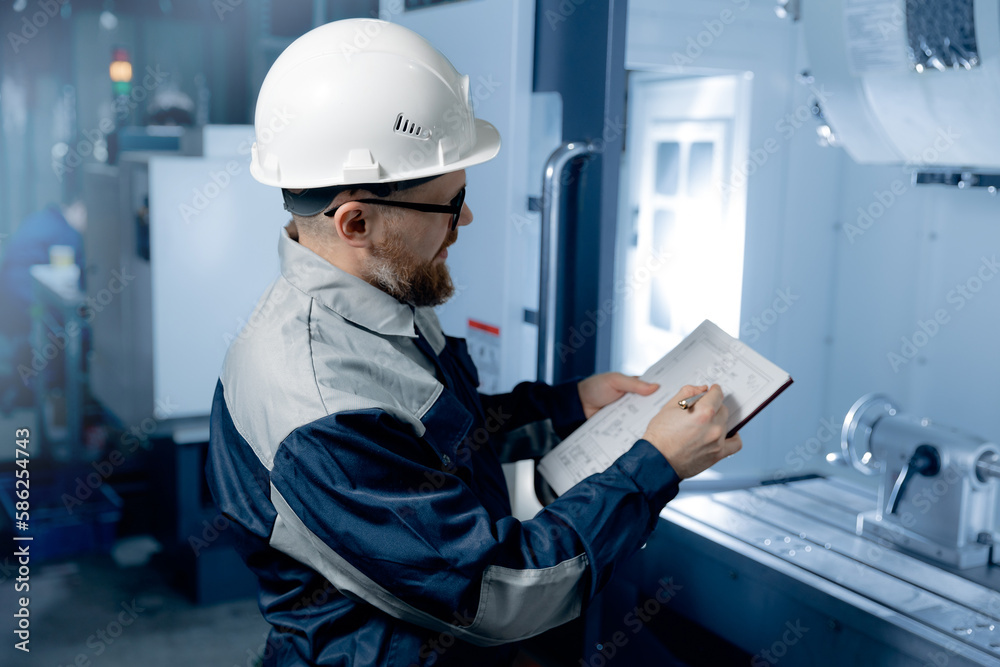 Worker caucasian engineer professional man control CNC machinery on industry factory Worker caucasian engineer professional man control CNC machinery on industry factory