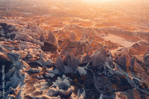 Sunset landscape Cappadocia stone and old cave house in Goreme national park Turkey sunlight, Aerial top view travel