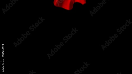 Elegant red fabric cloth transition reveal and opener. Cloth flying on black background. The video contains an alpha channel mask for transparent background.