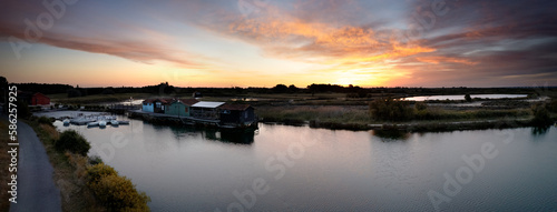 pink sunrise over the salt tides of the island of oleron photo