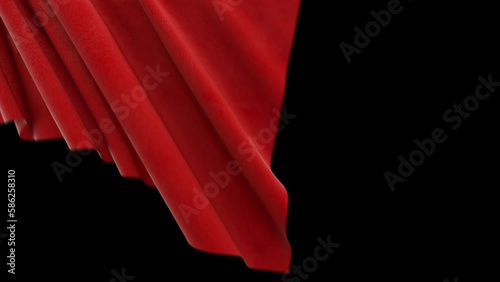 Red fabric cloth transition video effect on black background with alpha channel mask. Cloth moving across the screen reveals the transparent background.