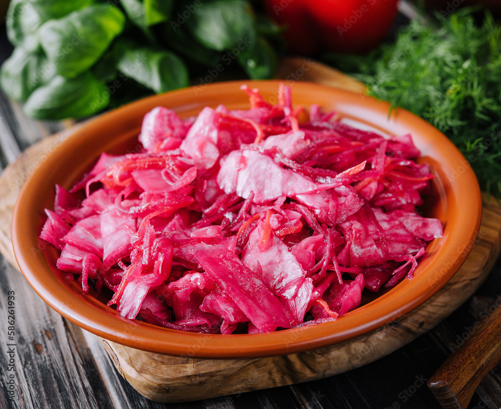 Salad with cabbage and beetroot on wooden table Salad with cabbage and beetroot on wooden table