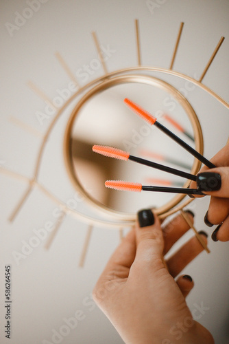 Different tools, brushes and varnishes of pedicure, manicure, eyebrow and lash maker masters in a beauty salon