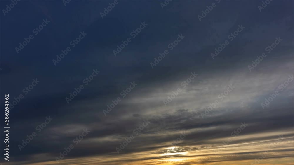 Dramatic summer evening sunset with wind blowing dark clouds time lapse Dramatic summer evening sunset with wind blowing dark clouds time lapse