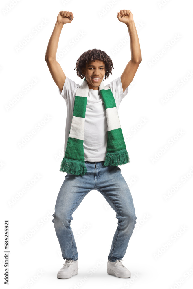 Happy african american young man cheering with a green and white scarf Happy african american young man cheering with a green and white scarf