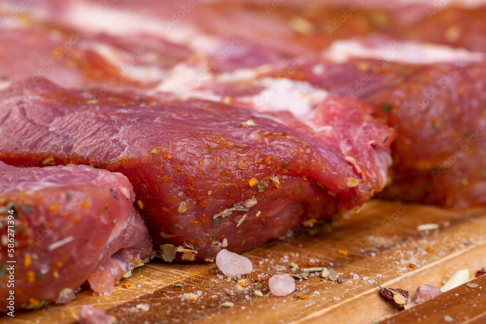 Pork meat pieces marinated with spices and salt Pork meat pieces marinated with spices and salt
