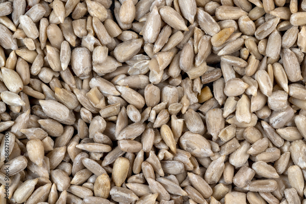 Sunflower seeds peeled from the black shell Sunflower seeds peeled from the black shell
