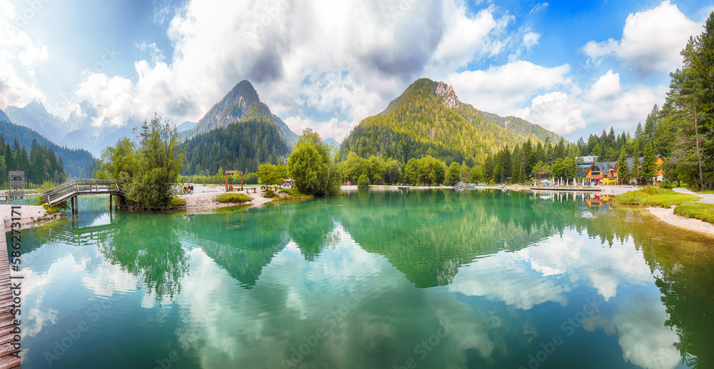 Amazing landscape on Jasna lake with beautiful reflections of the mountains.