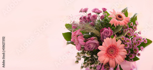 Colorful bouquet of pink flowers isolated on blur background.