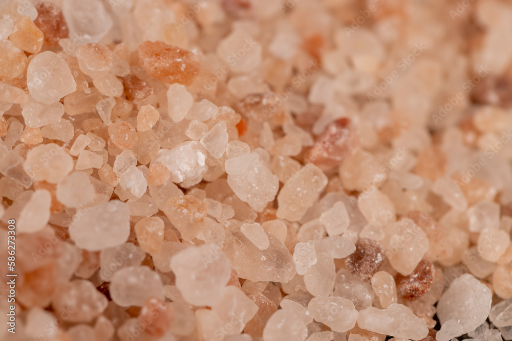 Pink natural salt on the table, close up Pink natural salt on the table, close up