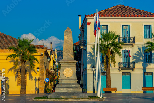 Sunset view of Filellinon square in Greek town Nafplio photo