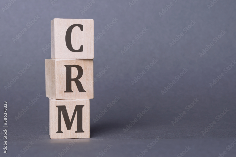Stack wood letters of CRM abbreviation - Customer Relationship Management Stack wood letters of CRM abbreviation - Customer Relationship Management