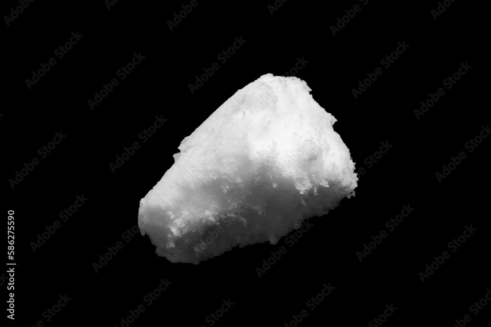 White snow isolated on black background close up White snow isolated on black background close up