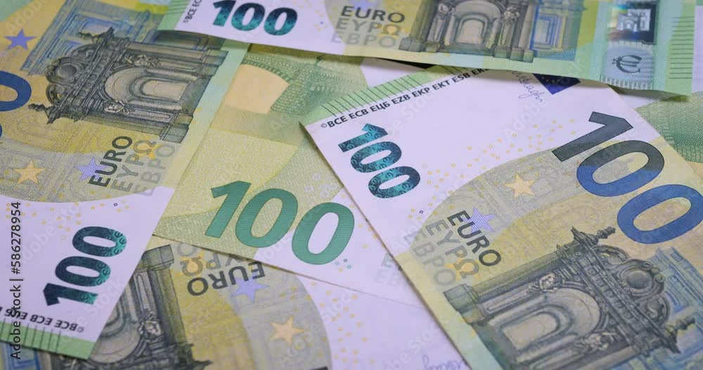 100 euro banknotes closeup. 100€ is one of the higher value euro banknotes used since the introduction of the euro in 2002. Wealth, finance, business, currency exchange, invest, banking concept. Dolly 100 euro banknotes closeup. 100€ is one of the higher value euro banknotes used since the introduction of the euro in 2002. Wealth, finance, business, currency exchange, invest, banking concept. Dolly