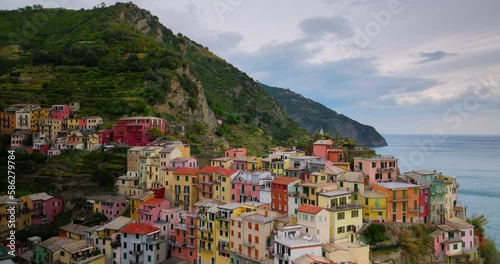 Village of Manarola Cinque Terre Italy Liguria famous historic town of colorful houses on the cliffs of Mediterranean Sea Drone view