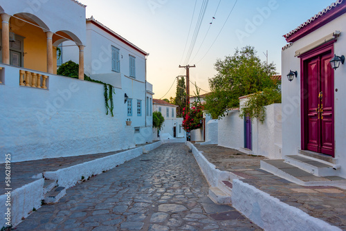 Fototapeta Naklejka Na Ścianę i Meble -  Summer day on a street in Greek town Hydra