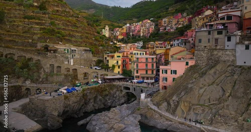 Town of Manarola Cinque Terre Italy Liguria famous historic town of colorful houses on the cliffs of Mediterranean Sea Drone view