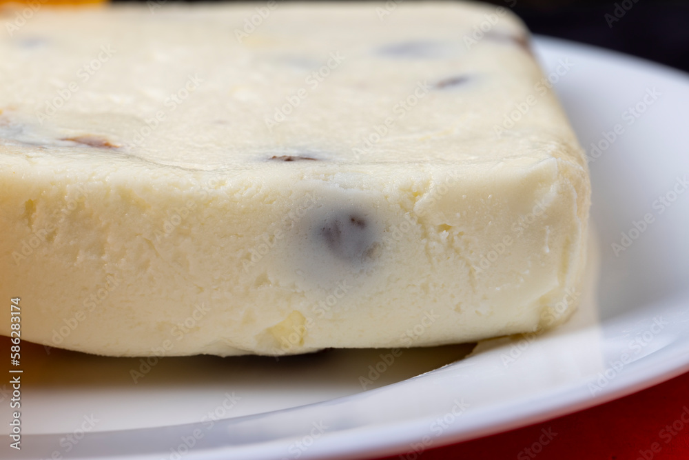 soft curd cheese with raisins and persimmons