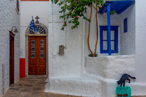Fototapeta Naklejka Na Ścianę i Meble -  Summer day on a street in Greek town Hydra