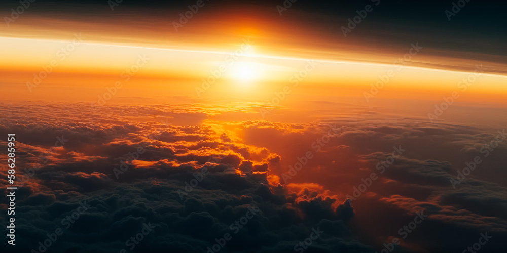 Beautiful sunset or sunrise with cloudy sky from the airplane window