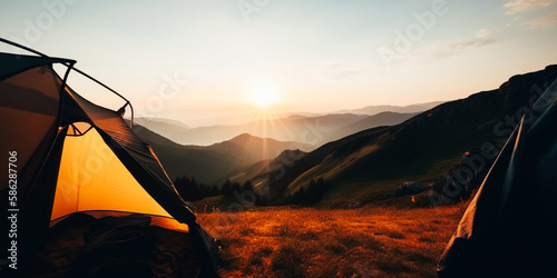 Tourist tent in camp among with mountain view on sunrise. 