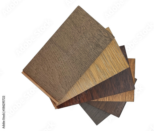 top view of stacked of wooden laminated flooring tiles sample for interior renovation isolated on background with clipping path. engineering floor tiles samples. construction materials.