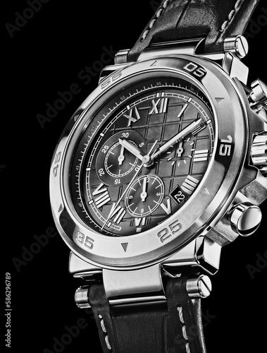 Dark hours. Luxury Men's Wrist Watch on a black background.