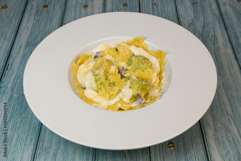 Recipe for Homemade Italian Ravioli pasta with Spinach and Ricotta Filling. High quality photo