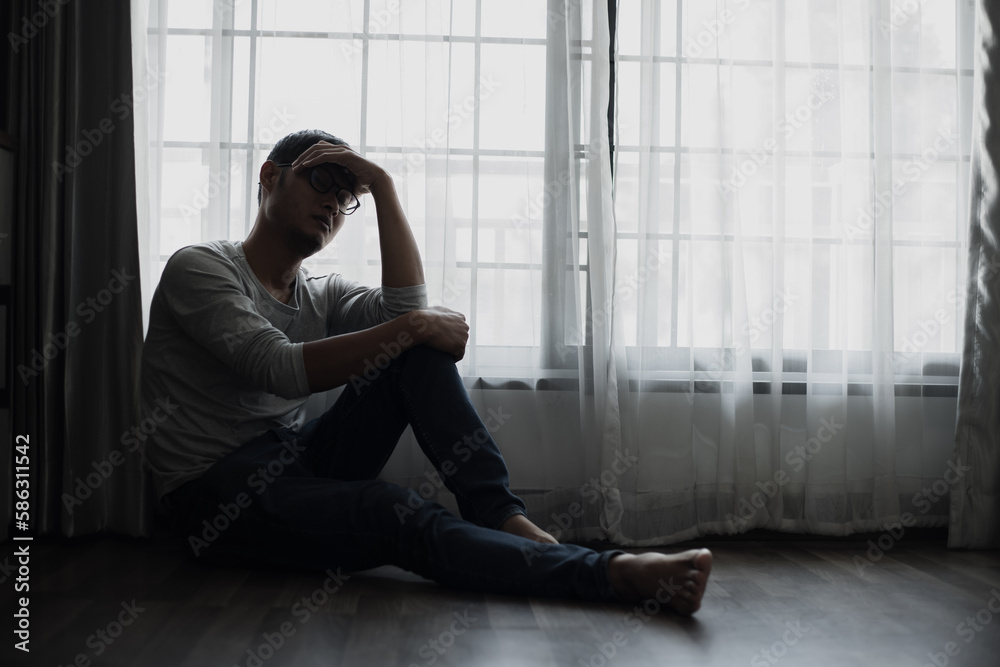 Sad young man in the bedroom, People with depression concept. Sad young man in the bedroom, People with depression concept.