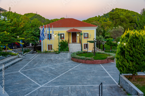 Sunset view of a colorful house at Archaia Olympia town in Greece photo