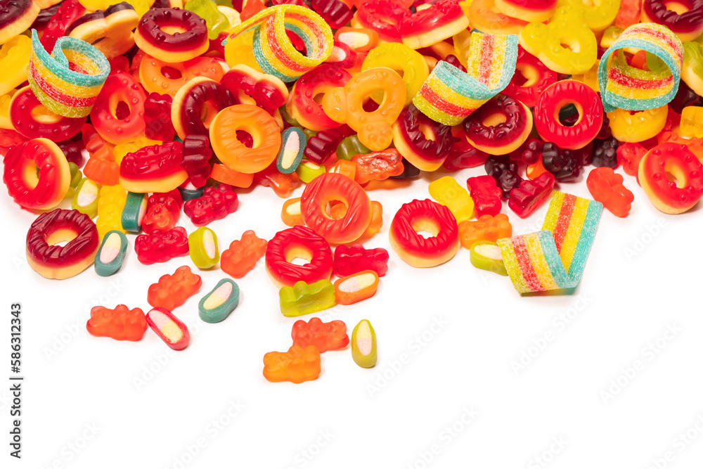 Assorted colorful gummy candies. Top view. Jelly donuts. Jelly bears. Isolated on a white background.