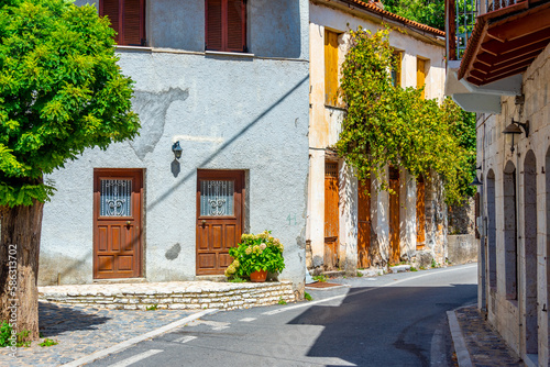 Narrow street in Greek village Stemnitsa photo