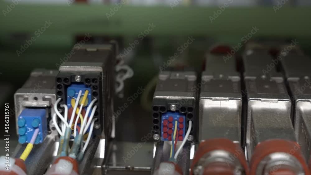 Close up hand held pan of electrical wires and connectors on a 787 commercial airplane. vídeo de