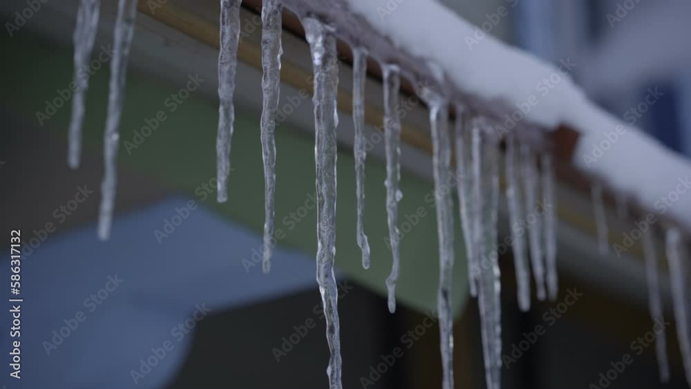 small icicles hanging from the roof of the house, Russian bath small icicles hanging from the roof of the house, Russian bath