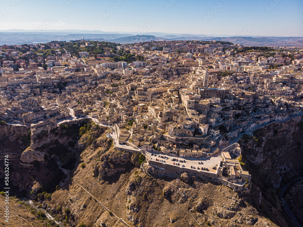 View from above, stunning aerial view of the Matera s skyline during a beautiful sunrise. Matera is a city on a rocky outcrop in the region of Basilicata
