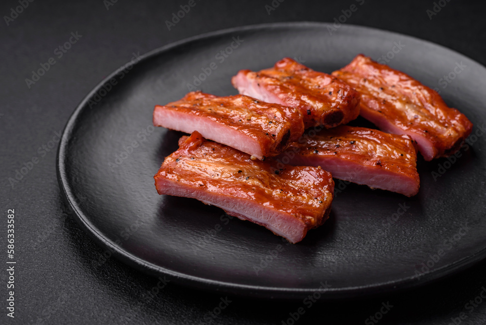 Grilled fresh juicy ribs with salt, spices and herbs Grilled fresh juicy ribs with salt, spices and herbs