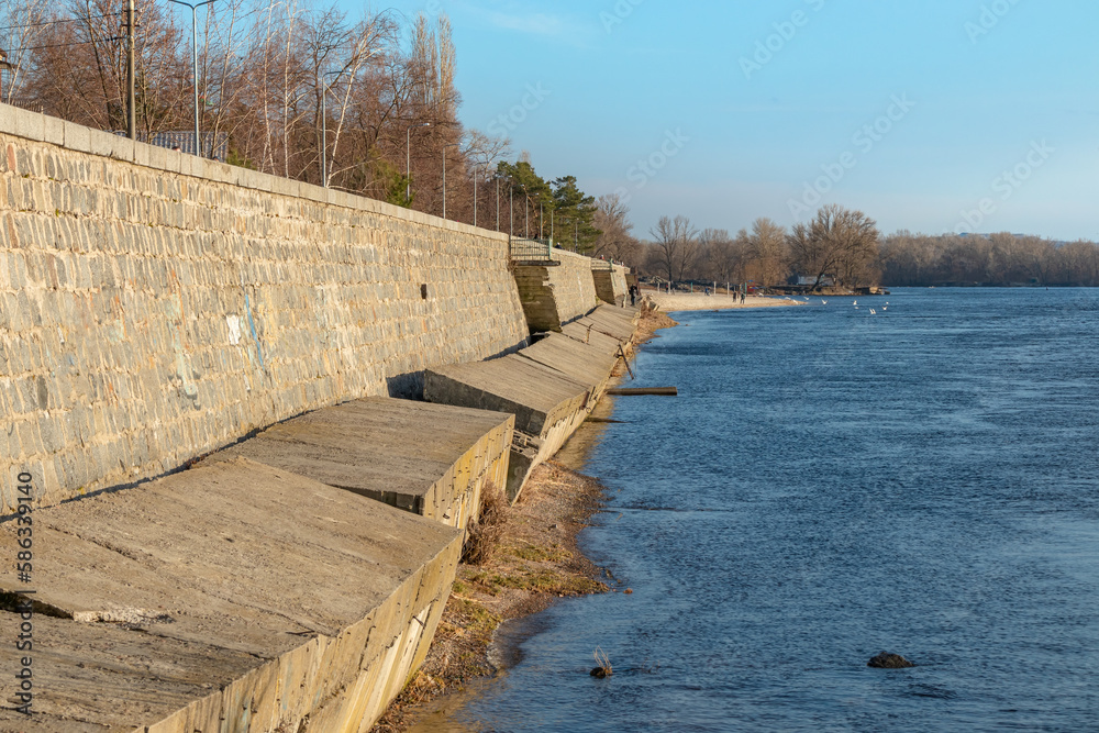 Ruined embankment on the banks of the Dnieper river in Kremenchuk city, Ukraine