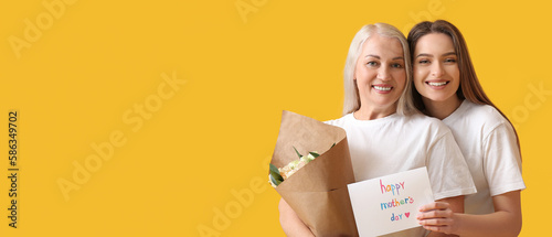 Happy young woman and her m...