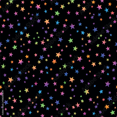Seamless pattern of bright multi-colored stars on a black background