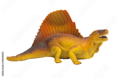 An isolated toy dinosaur in profile. Yellow and orange Dimetrodon.