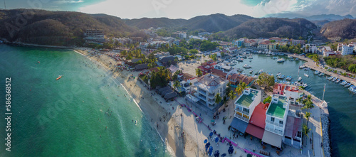 drone photo of huatulco oaxaca mexico panoramic summer scenic view vacation spot pacific coast america in the sunset  photo