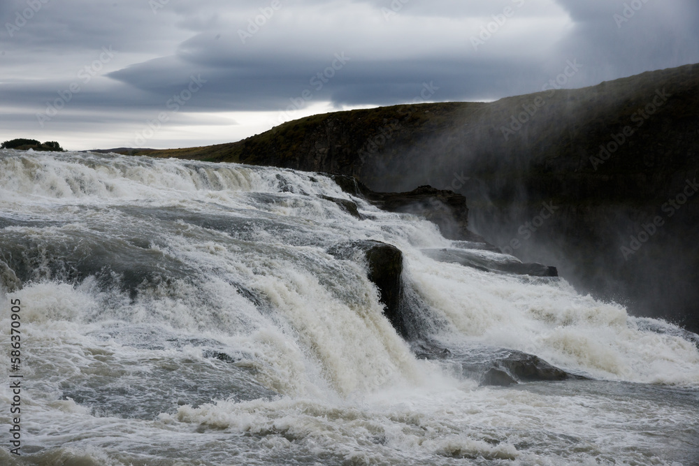 Abundant water flowing at Gullfoss waterfall, Iceland Abundant water flowing at Gullfoss waterfall, Iceland