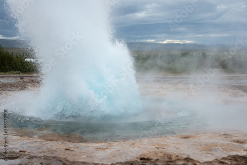 Geyser in Iceland with spouting hot springs
