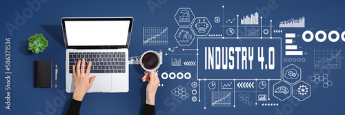 Industry 4.0 theme with person using a laptop computer
