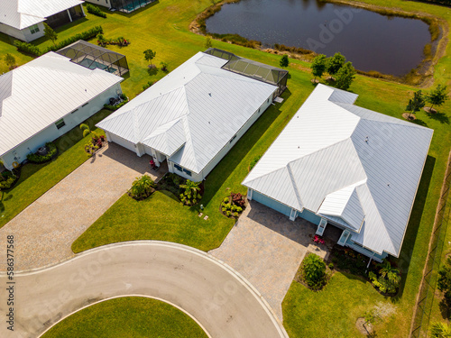 Fényképezés Upscale homes with metal roofs in Vero Beach FL